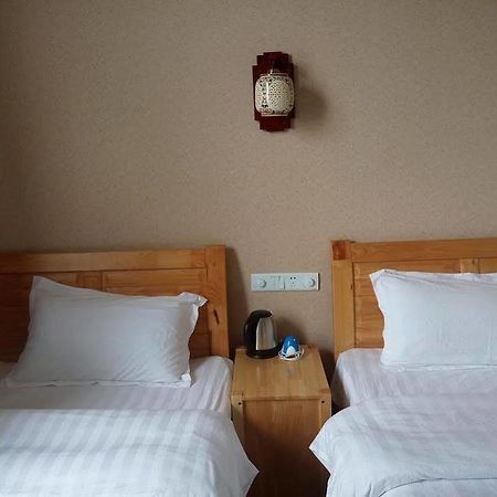 Shuanglang Jinxiangyuan Hotel Dali Shuanglang ภายนอก รูปภาพ