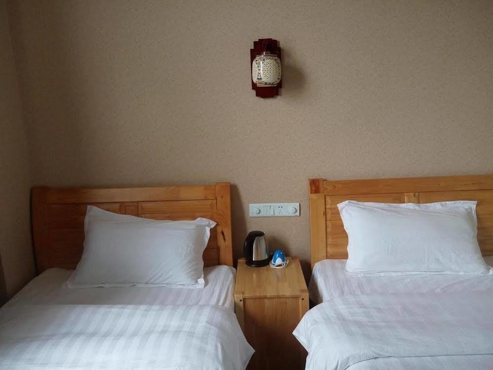 Shuanglang Jinxiangyuan Hotel Dali Shuanglang ภายนอก รูปภาพ
